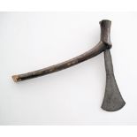 An African tribal palstave axe with an iron broadhead with expanded wedge-shaped blade with no