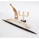 An African elephant ivory tusk carved with elephants L49cm, weight 587g (damaged), together with