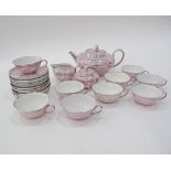 An Italian Art Deco Verbano Porcellana Di Laveno, sterling silver overlay on pink porcelain tea set,