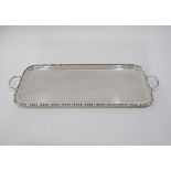 A good quality English Finnigans Ltd - Manchester, silver plated oblong tray with handles W56cm,