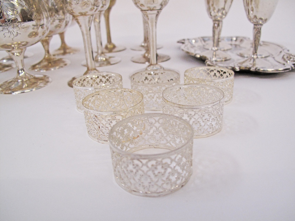 A collection of silver plated drinks goblets in four sizes together with twelve napkin rings and - Image 3 of 6