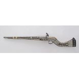 An Afghan c19th century Jezail flintlock musket, inlaid mother of pearl stock and butt and brass