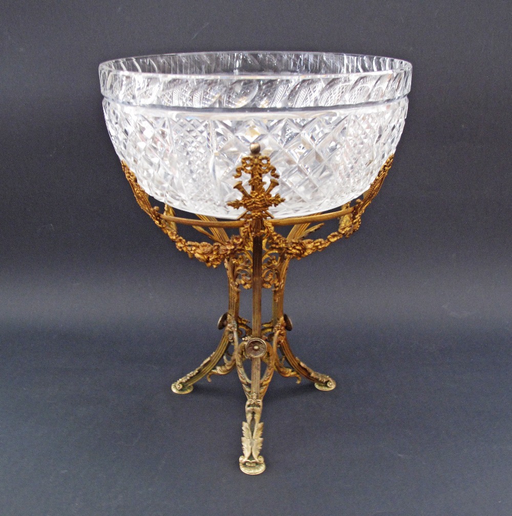 A French Empire probably Baccarat cut crystal bowl in a gilt bronze epergne, colourless glass, of