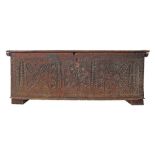 A Cypriot carved cypress chest c18th century from Akanthou. H59cm, W155cm, D51cm.