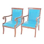 A pair of French style walnut armchairs