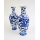 A pair of Chinese blue and white egg-shell porcelain dragon vases