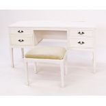 A white painted kneehole dresser with stool