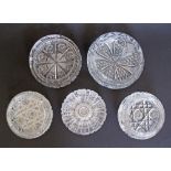 A collection of five Bohemian crystal hand cut ashtrays