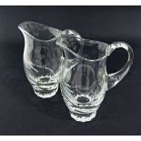 A pair of crystal pitchers