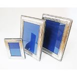 Three Silver plated photo frames