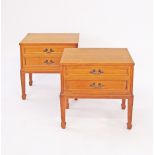 A pair of oak veneered two drawer commodes