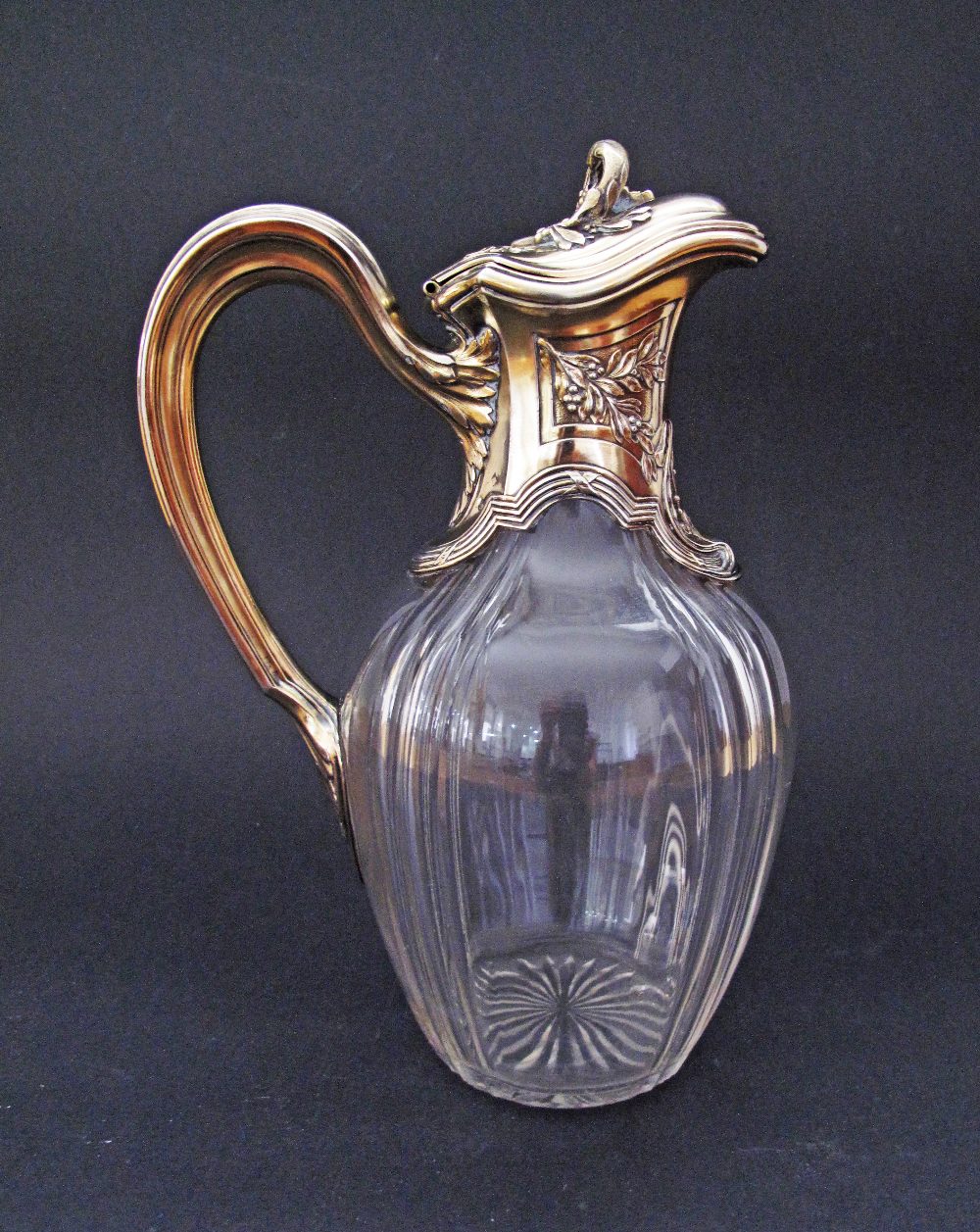 A French gilded sterling silver mounted crystal pitcher by Videpied, Okermann, Poircuite & Cie