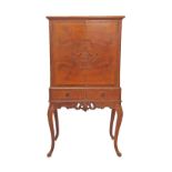 A Chippendale style carved walnut bar cabinet