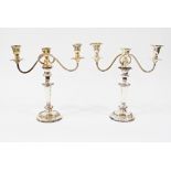 A pair of 20th Century silver plated three light candelabra