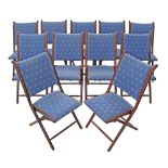 A set of eleven stained beech folding chairs