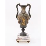 A French c19th century bronze vase on marble plinth.