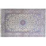 Persian carpet blue on beige ground 193X124cm signed.