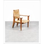 MARCEL GASCOIN 1907-1986 Rare et important fauteuil Chêne vernis et paille Édition [...]