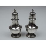 A Pair of George V Silver Pepper Pots - Baluster Shaped, with Pierced Pull-Off Covers - Hallmarked