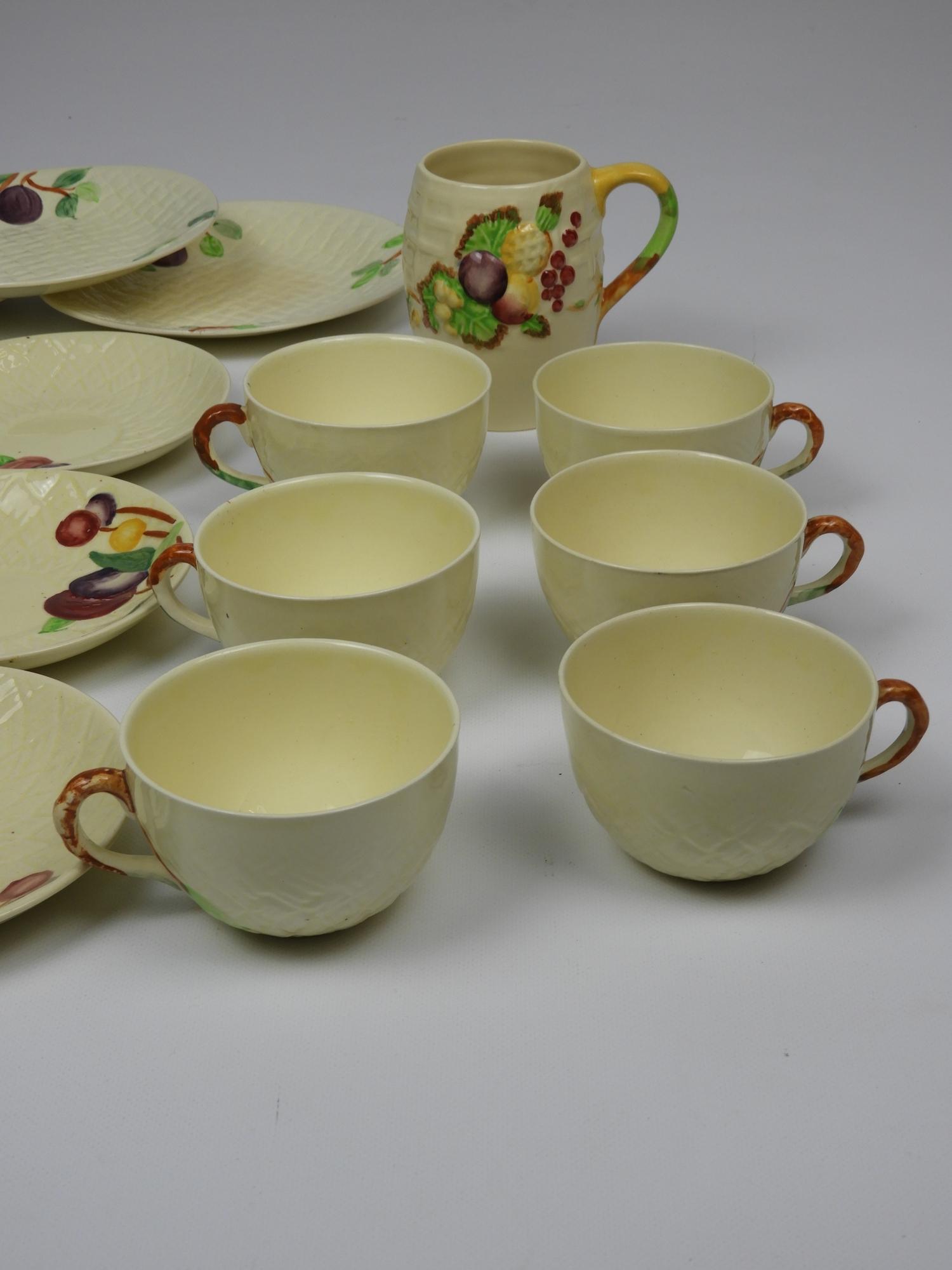 Royal Staffordshire Pottery - A.J Wilkinson, Clarice Cliff Design Tea Cups, Saucers, Plates and Mug - Image 3 of 5