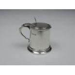 A Silver Mustard Pot - Formed as a Tankard, Hinged Cover with Thumb Piece and Blue Glass Liner -