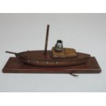 A Vintage Wooden Boat Lamp Base Carved in the Form of a Boat with a Vintage Lamp Fitting on Top -