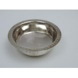 A Channel Isles Silver Circular Dish, with Stamped Decoration Around the Rim and a Domed Base -