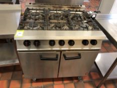 Falcon stainless steel gas fired 6-burner double Oven (located in Kitchen)