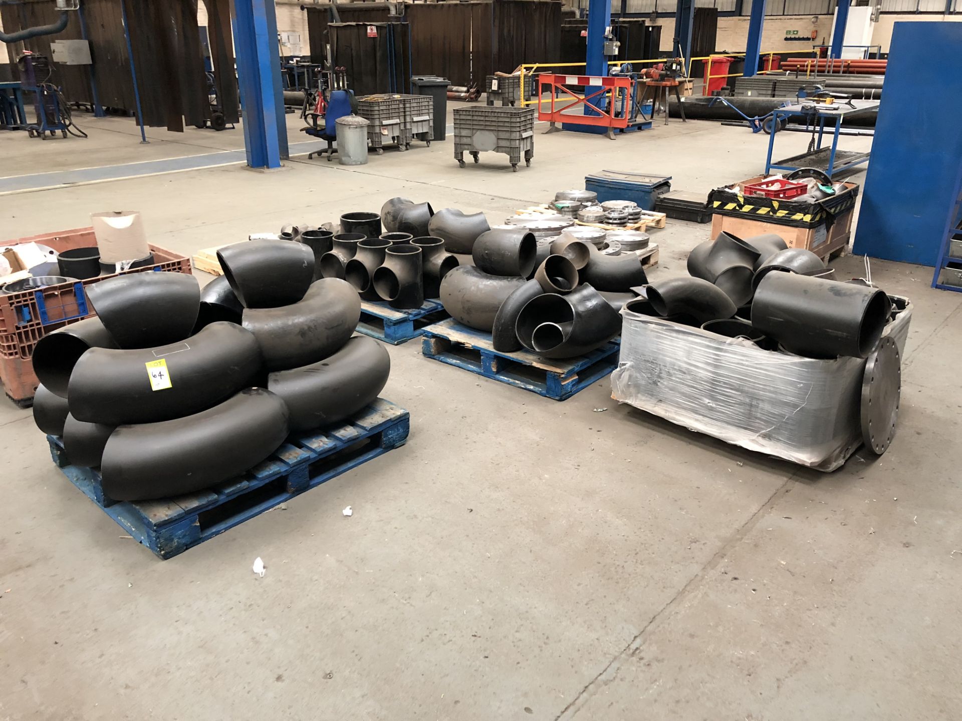 Large quantity steel Blanking Plates, Pipe Bends, etc, to 9 pallets and stillages (located in Bay