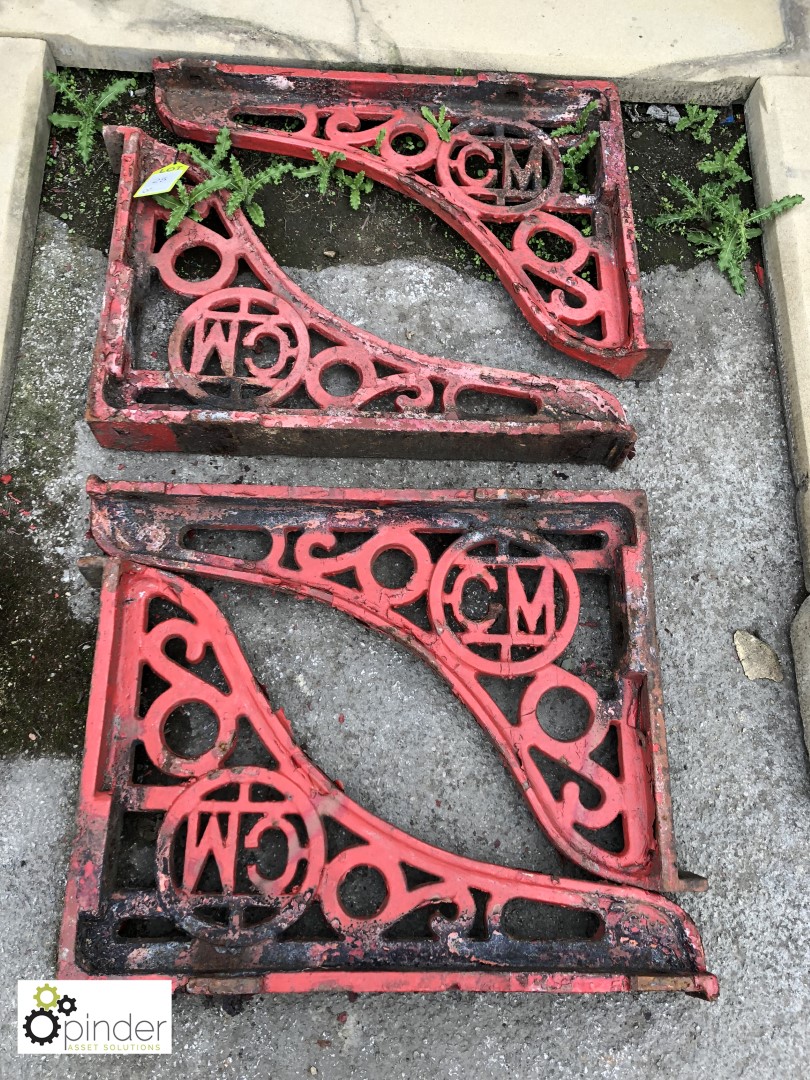 Cast iron Bracket with initials “GM” embossed
