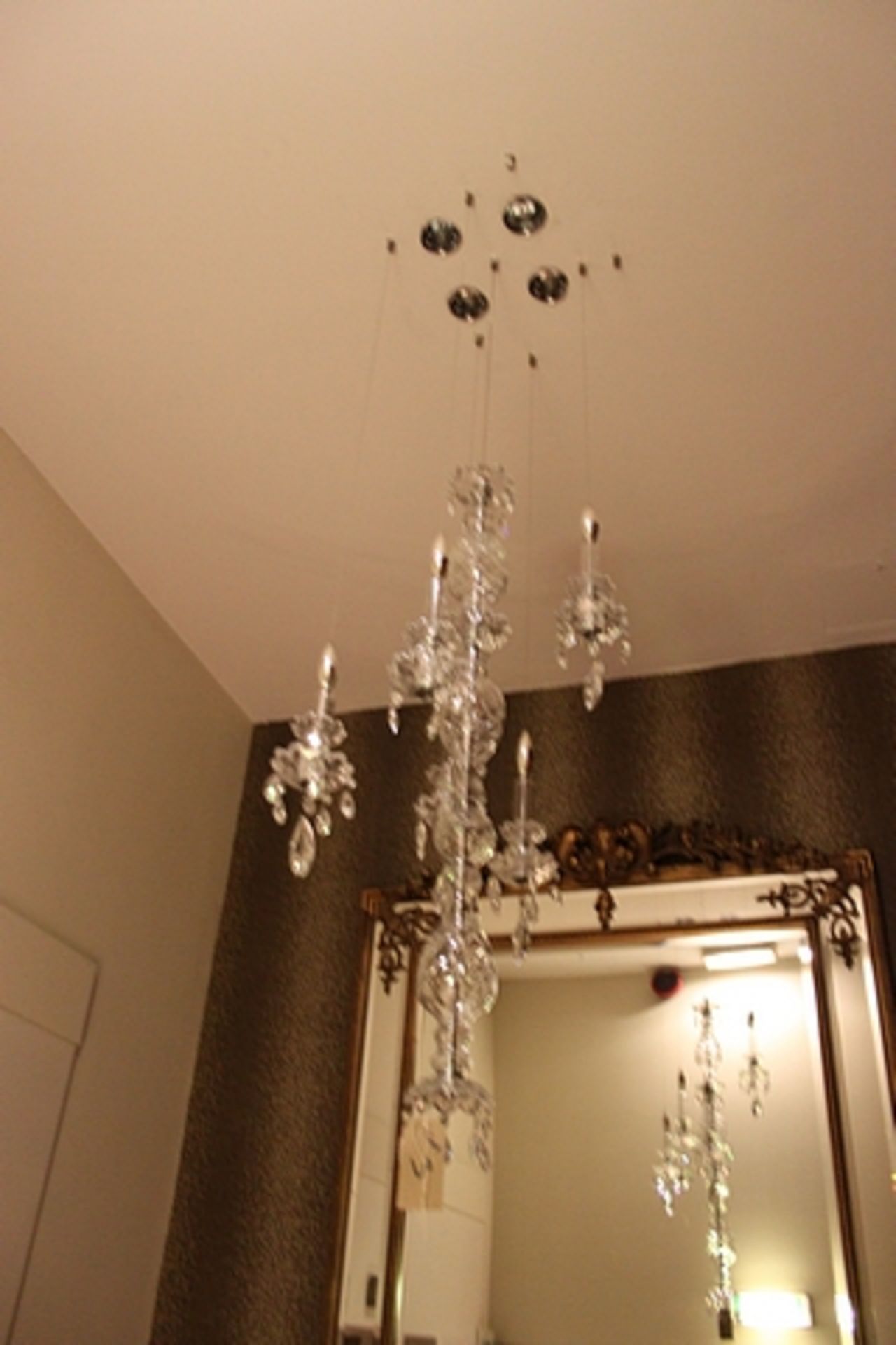 Crystal pendant light fitment comprising counter down pendant and 5 further down pendants wire