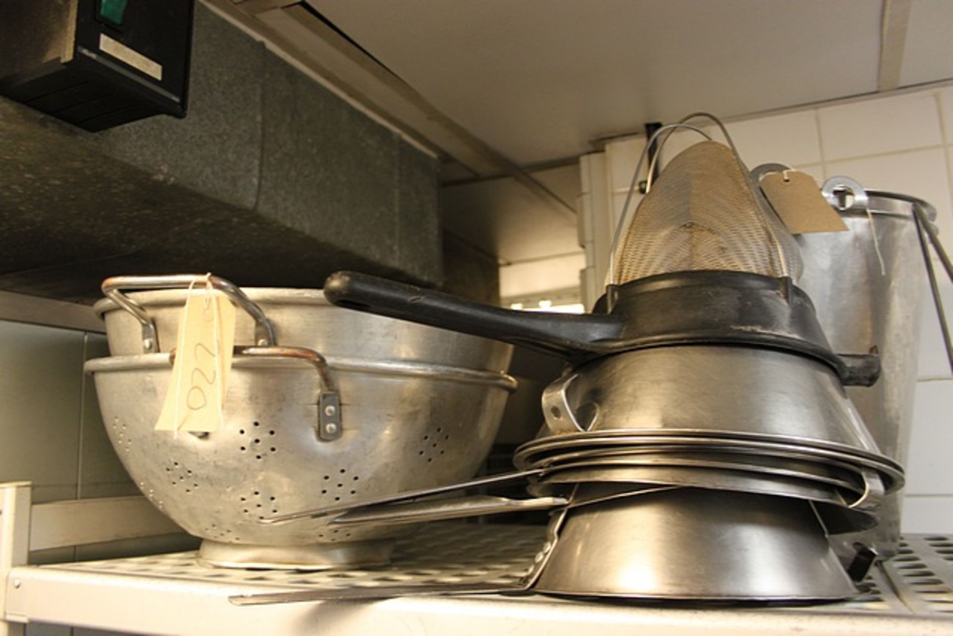 Various colanders and conical sieves as lotted