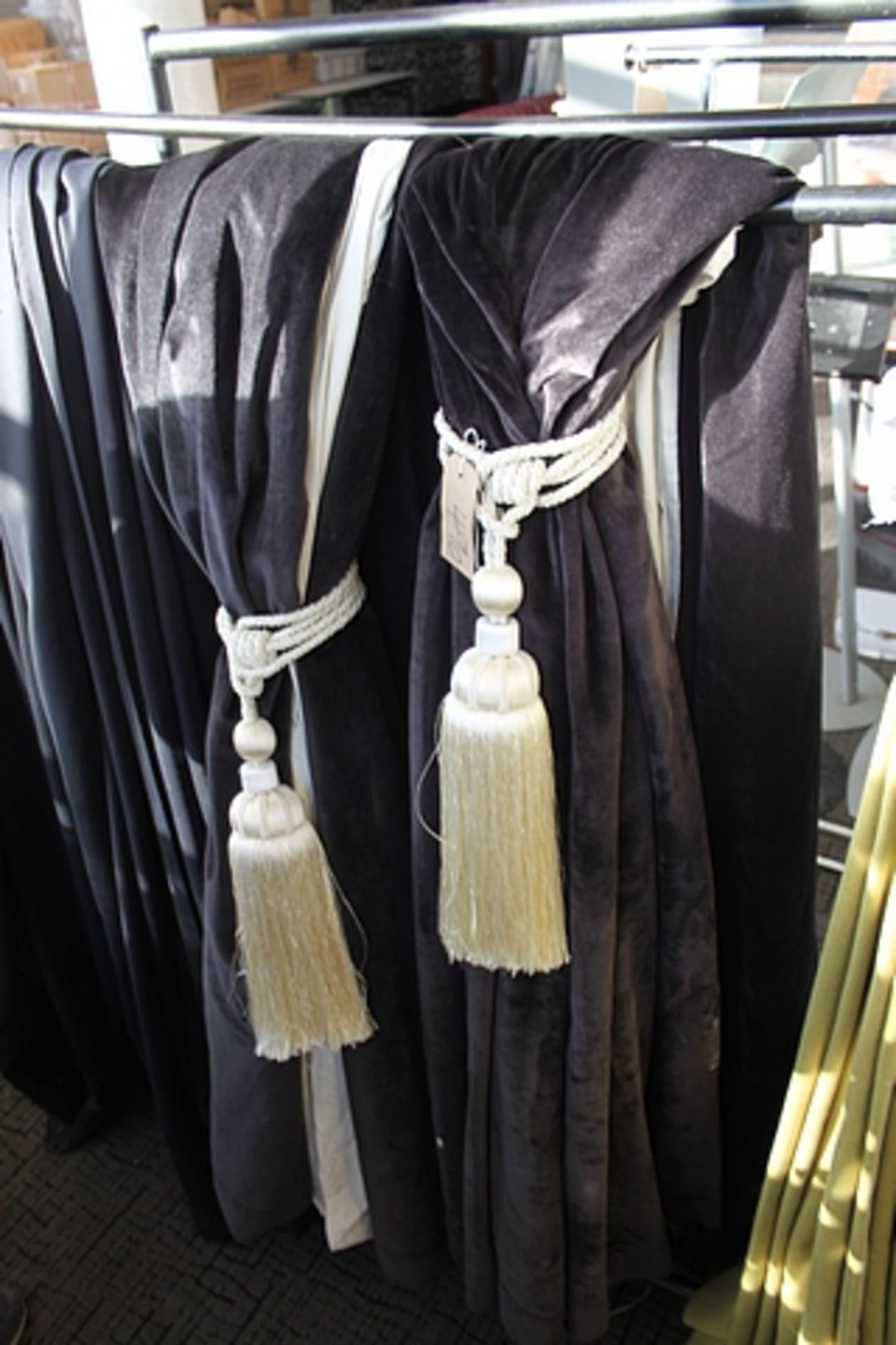 A pair of black velvet drapes drop 2800mm spans 5.6mtr