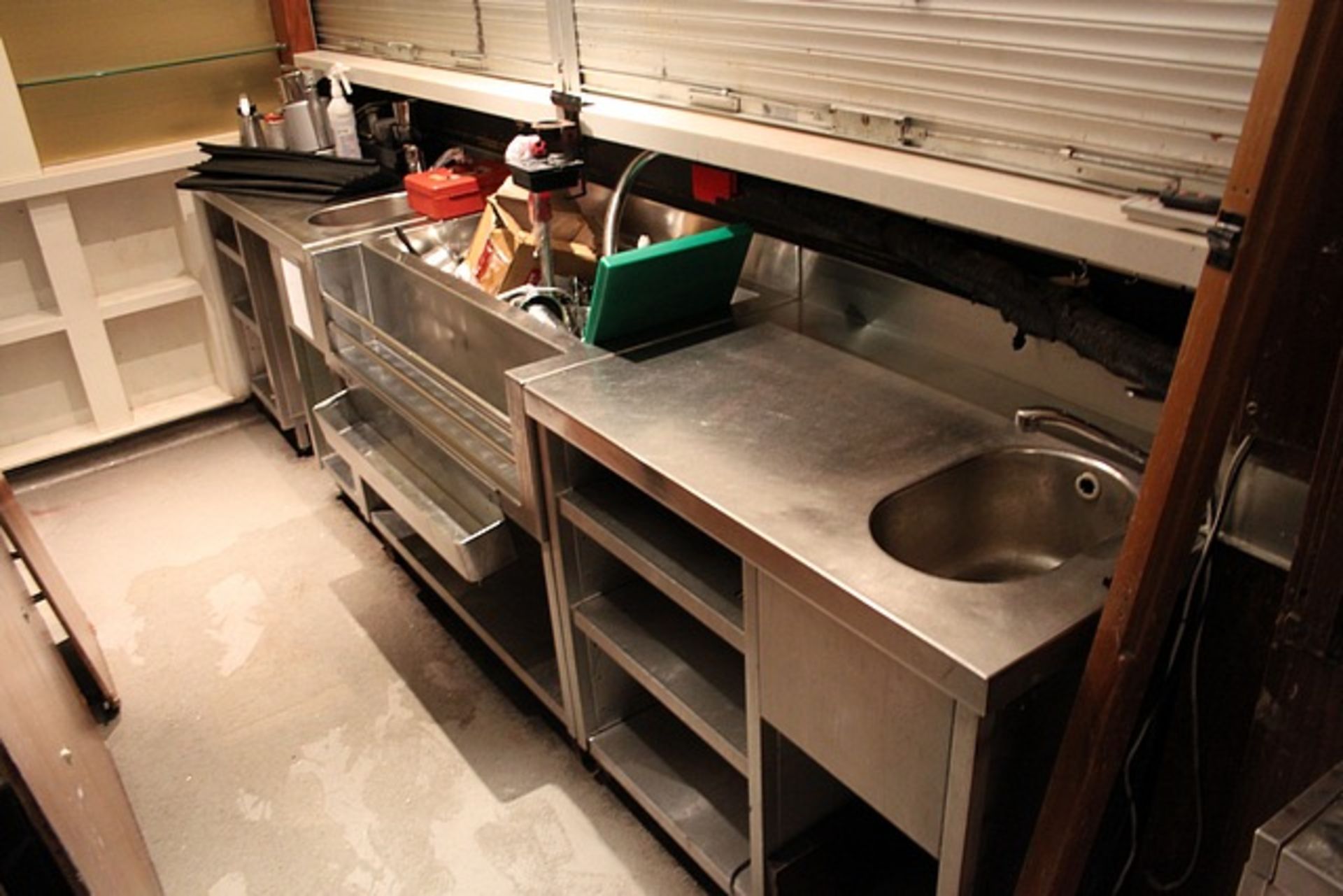 Stainless steel back bar countering comprising of 2 x wash basins, speed rails, ice dump and storage