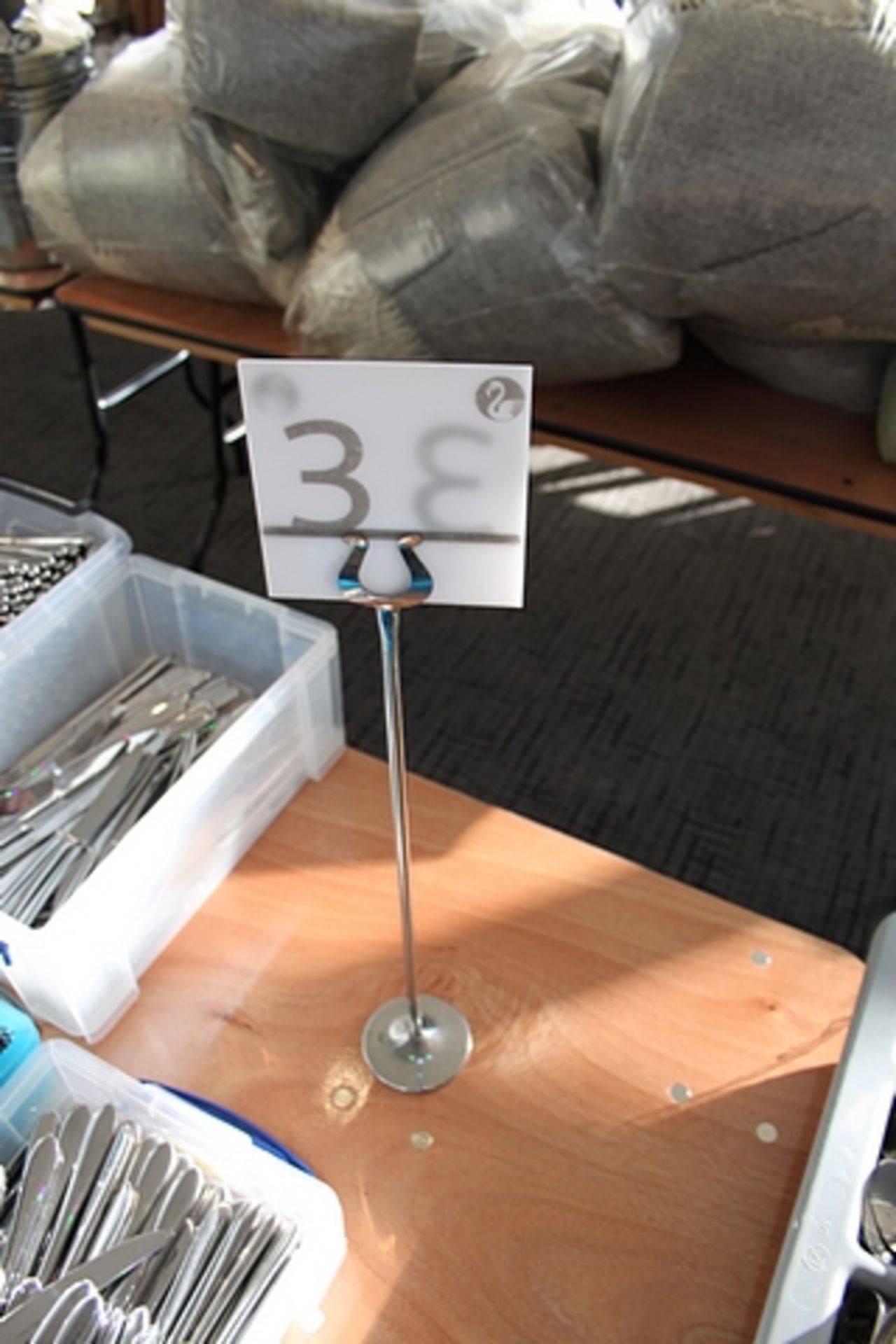 Approximately 30 x stainless steel table number stands