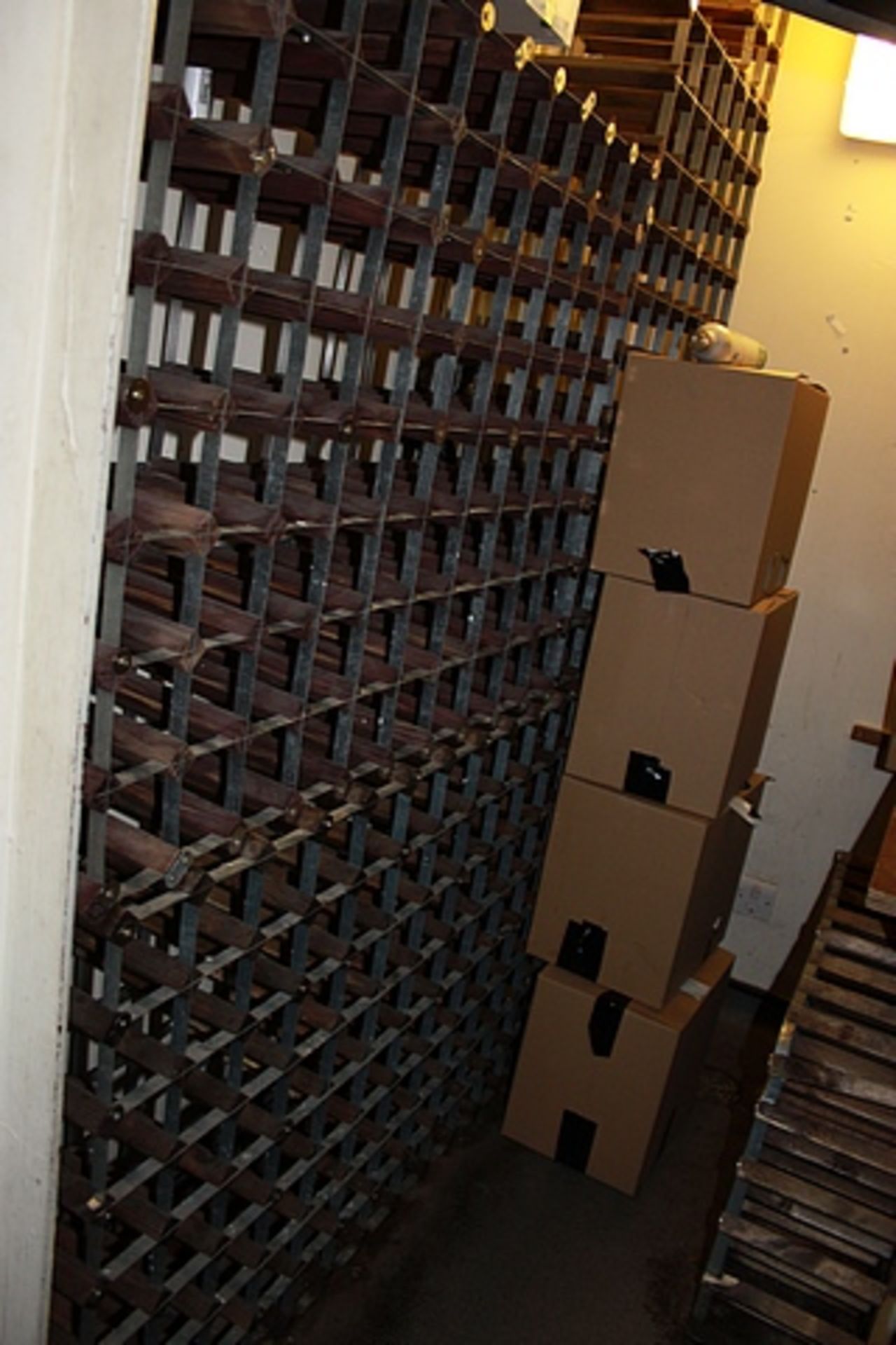 A large quantity of wine rack shelving holds 369 bottles