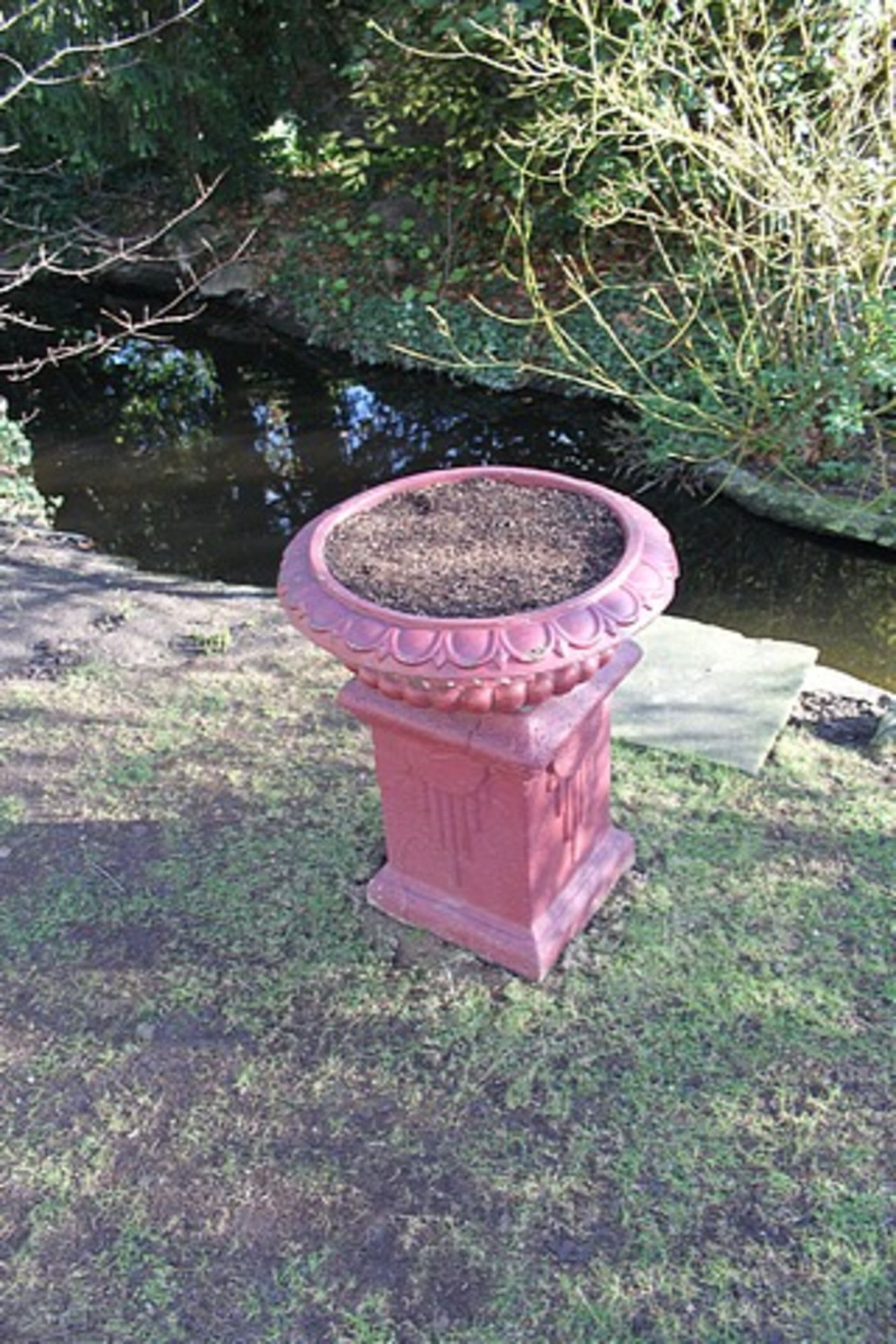 3 x Corinthian style vase planters on plinth