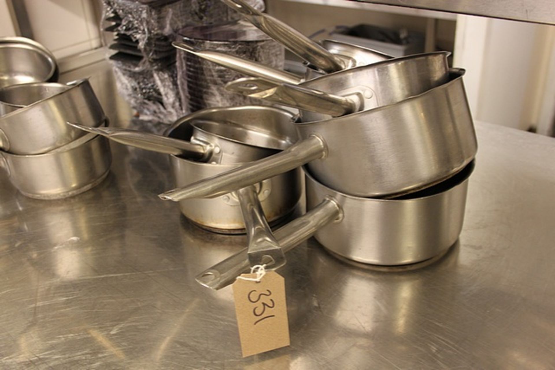8 x various stainless steel saucepans as lotted