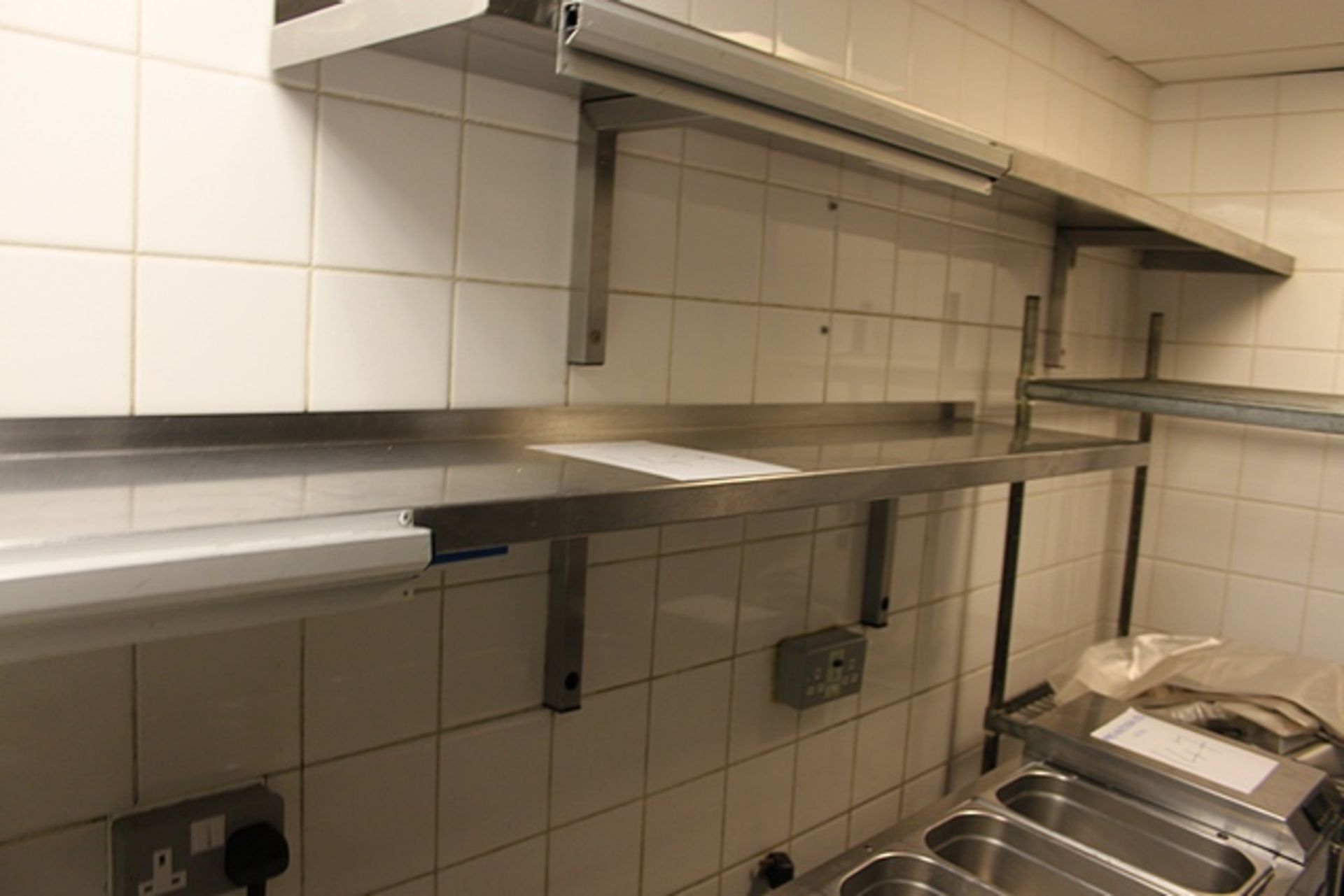 Stainless steel wall mounted shelf with grab tab 2300mm x 300mm