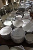 A large quantity of white tableware principally Steelite and Dudsons comprising dinner plates,