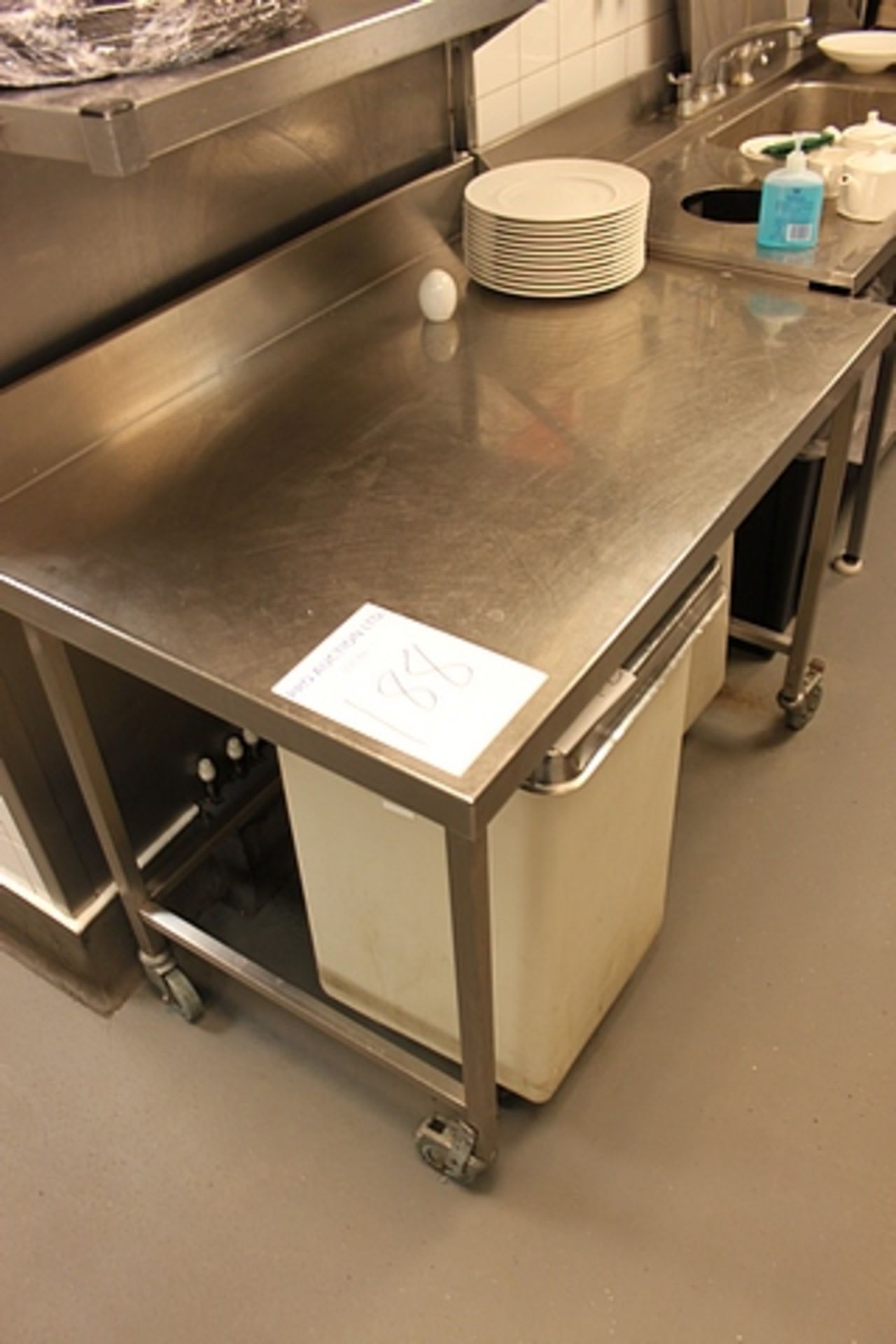 Stainless steel mobile table with upstand 1170mm x 760mm