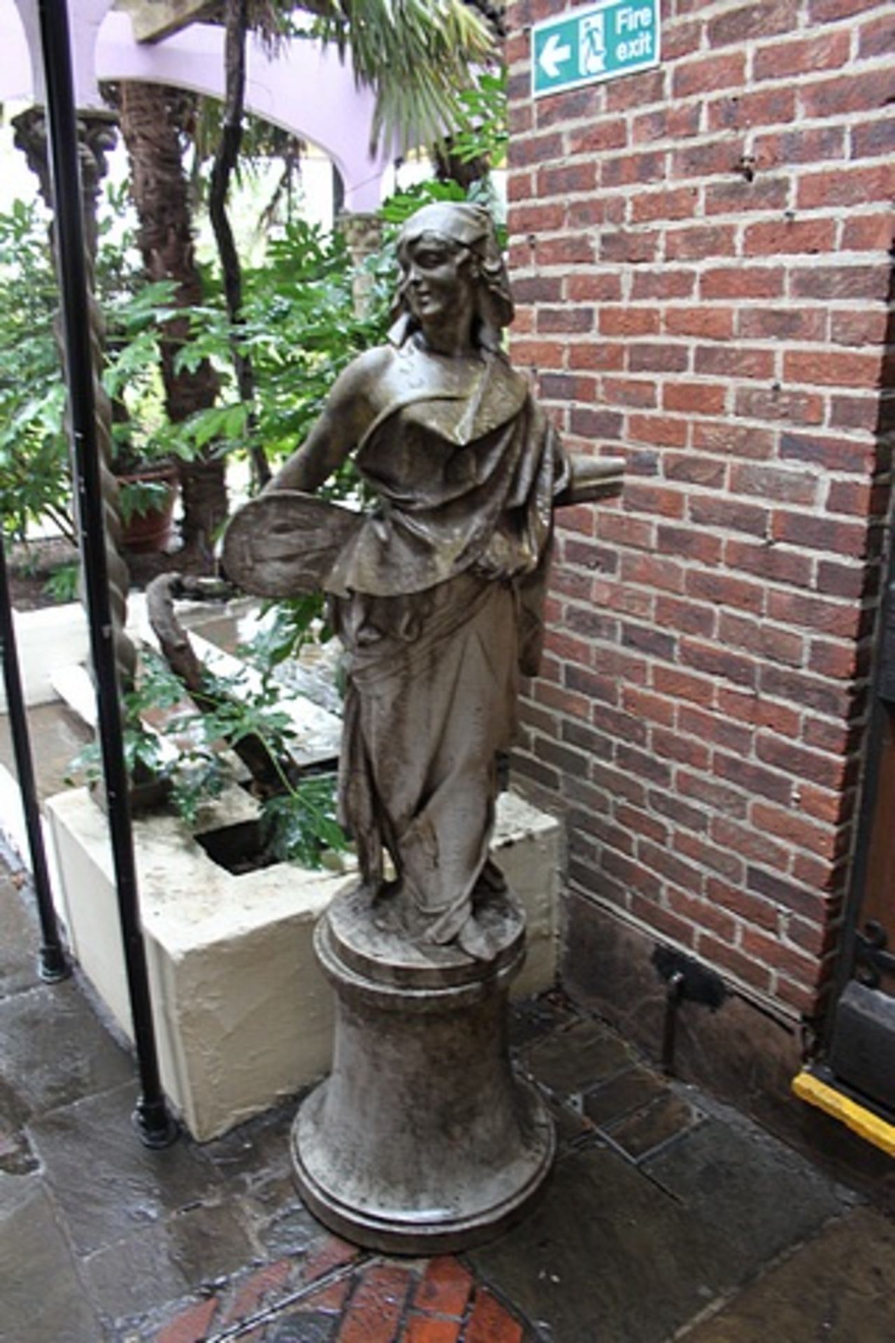 Composite stone state of a female with mandolins 2 mtr tall