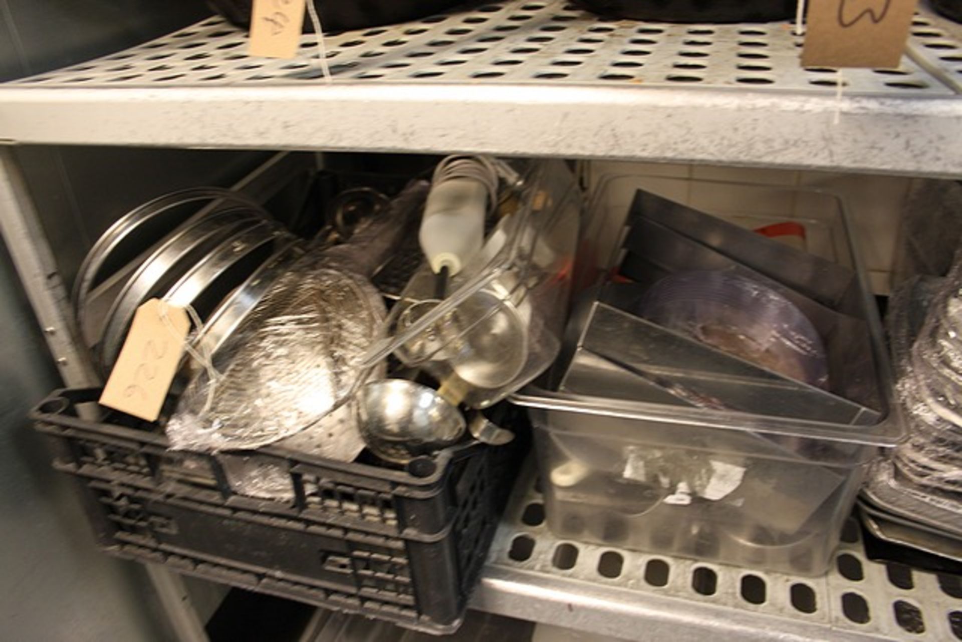 A large quantity of various kitchen chef utensils as lotted - ladles, scoops, cake rings etc.
