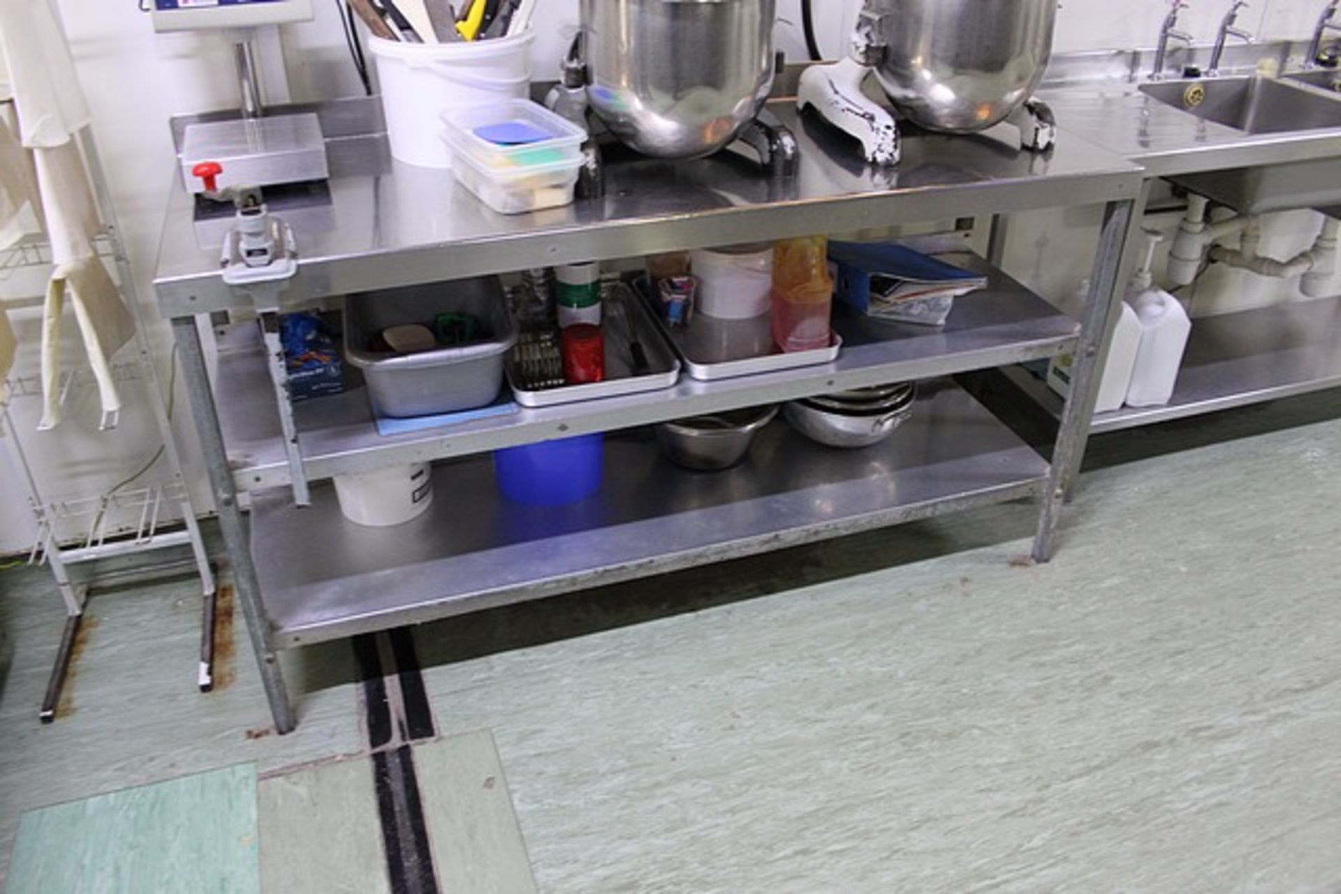 Stainless steel table with can opener 2 x undershelves and up stand 1670mm x 600mm