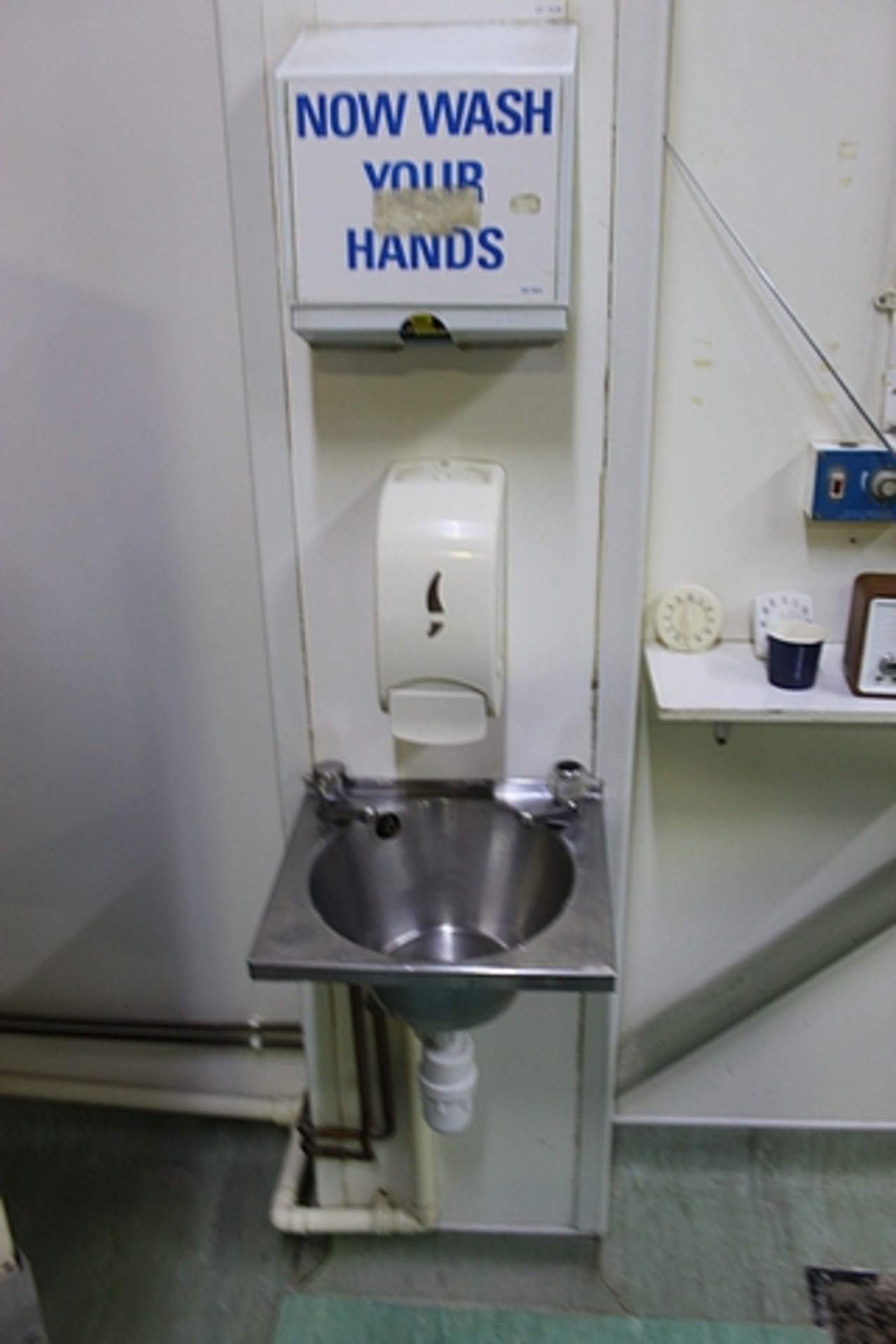 Stainless steel wall mounted hand wash basin