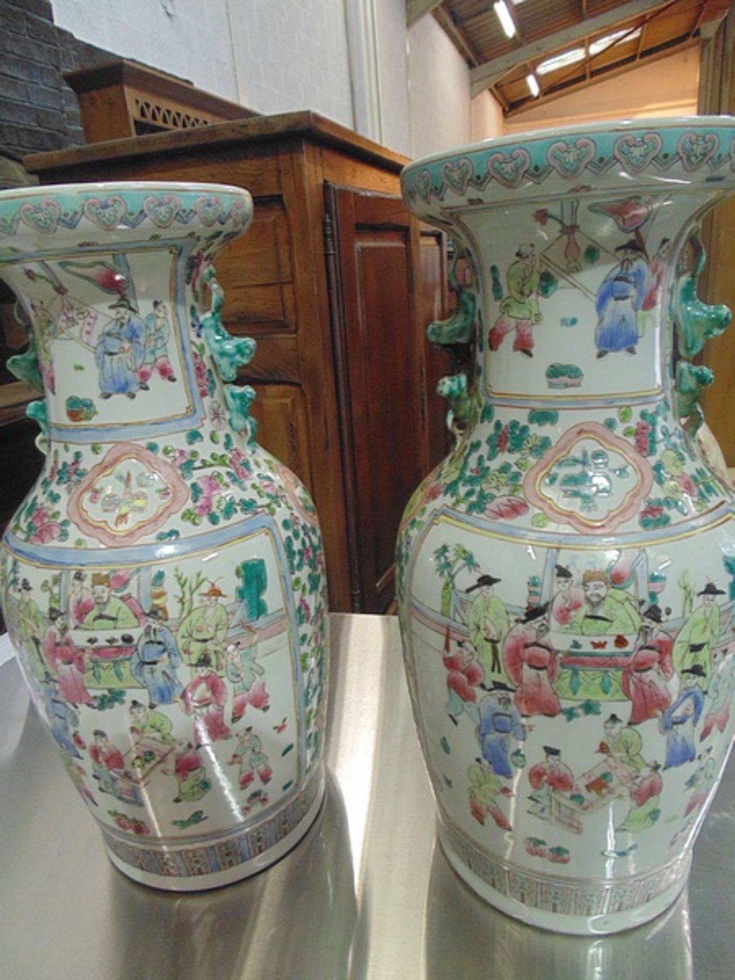 A Pair Of Famille Rose Canton Vase Of Baluster Form With Trumpet Shaped Rims The Bodies Decorated