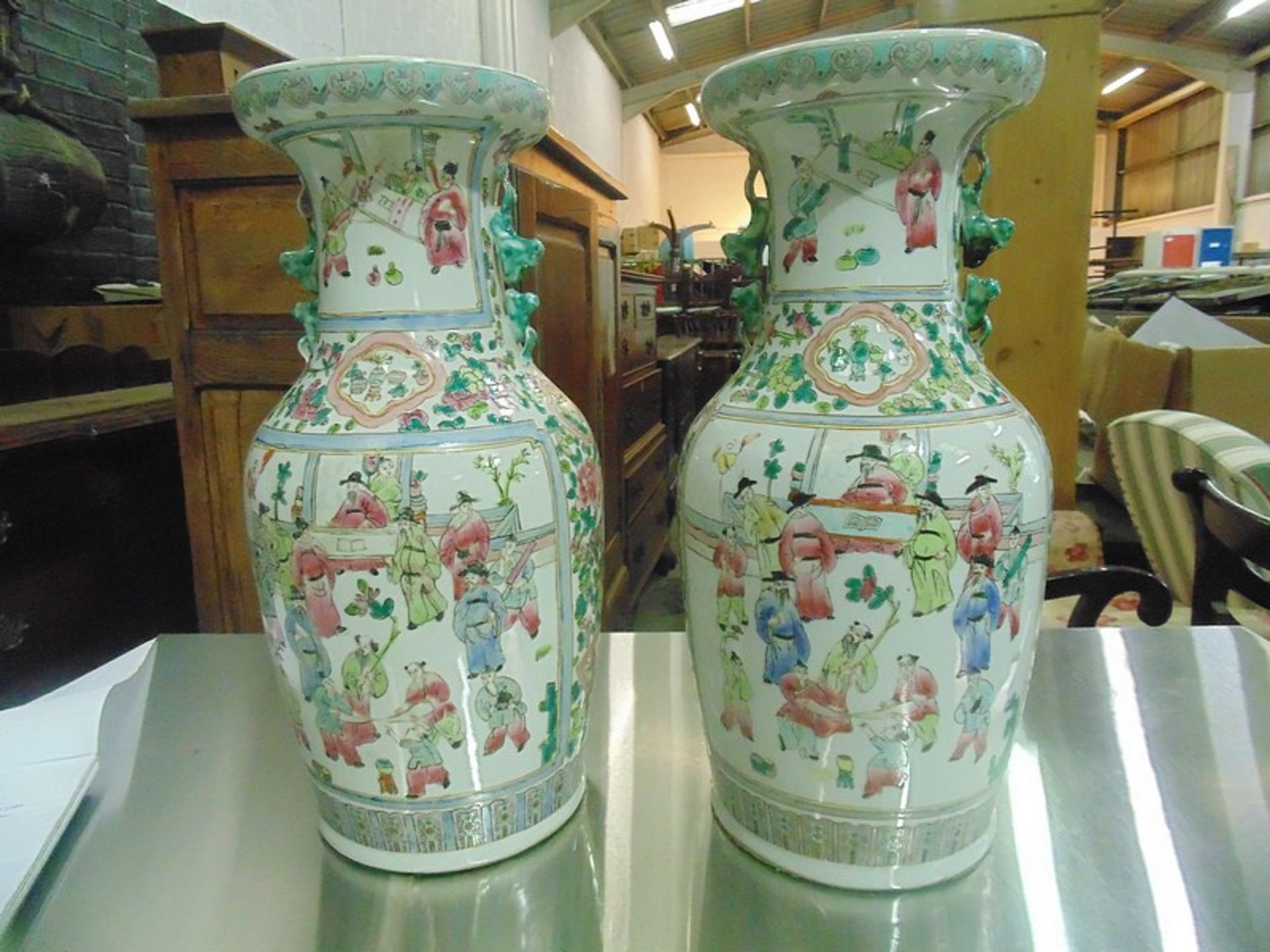 A Pair Of Famille Rose Canton Vase Of Baluster Form With Trumpet Shaped Rims The Bodies Decorated
