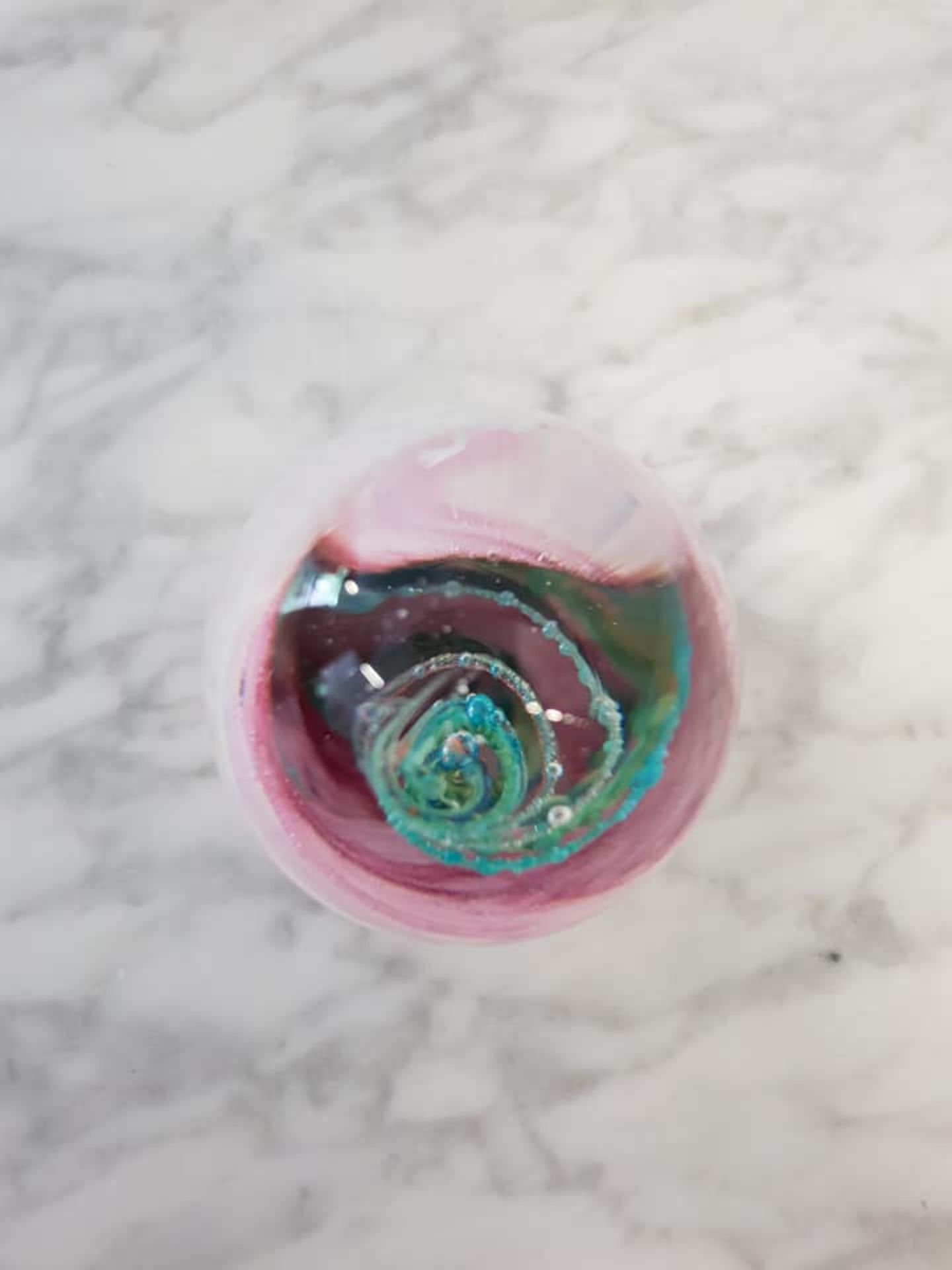 Bohemian blown art glass ovoid paperweight 10cm pink and white with a green floral design - Image 2 of 2