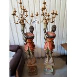 A near pair of Venetian Blackamore seven branch candelabra Torcheres 200cm tall