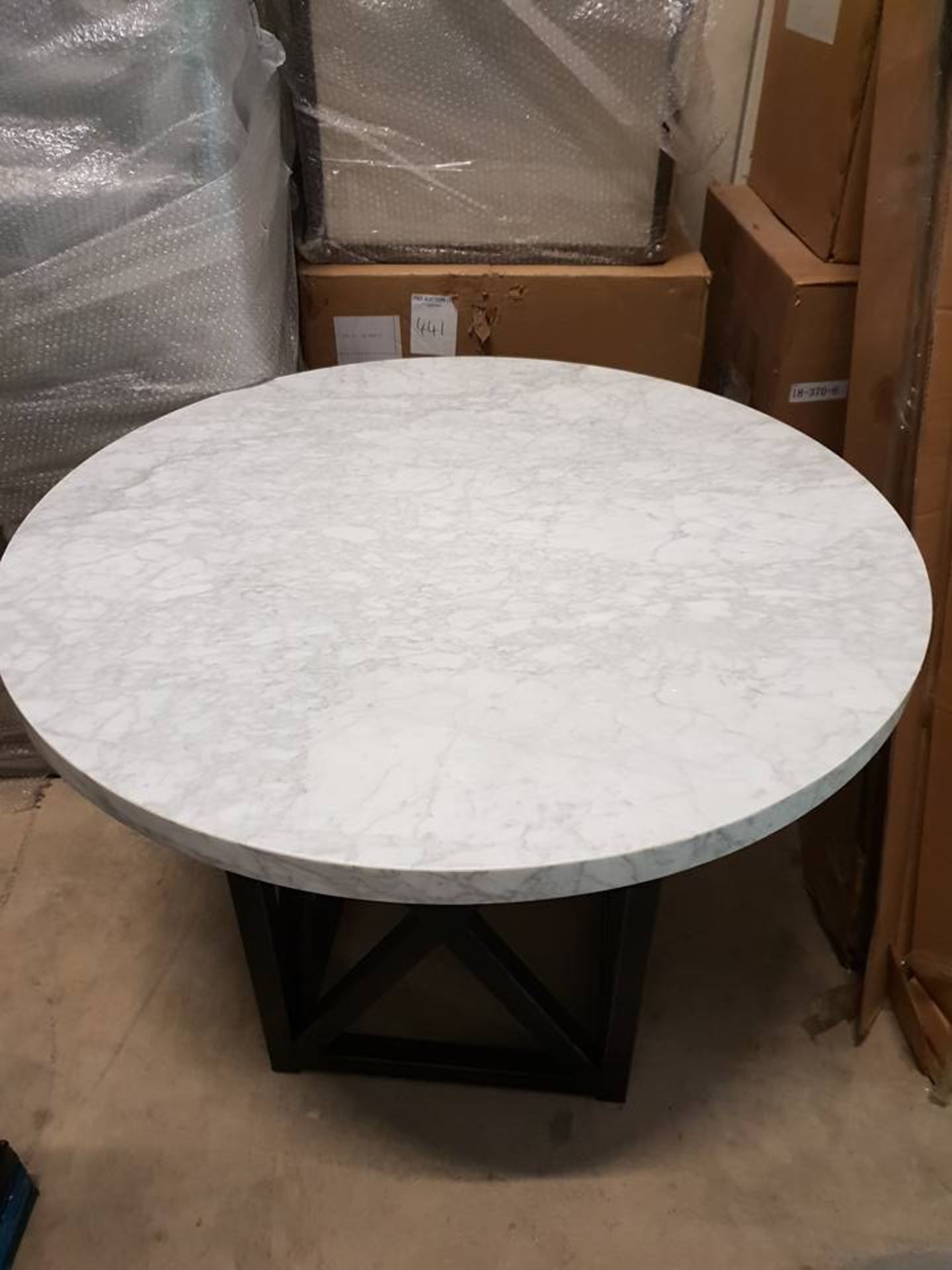 Axel Round Dining Table Marble and Iron Base 100cm diameter x 76cm tall This round version of our